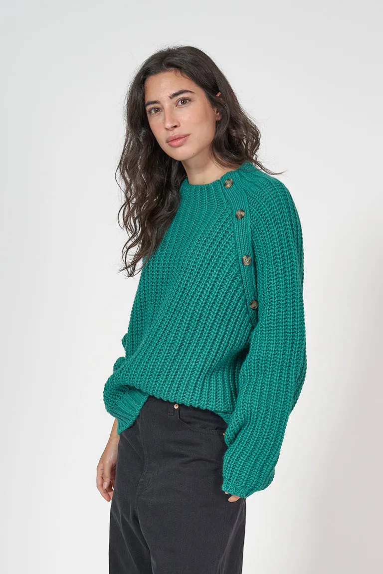 Jersey de punto con botonadura decorativa